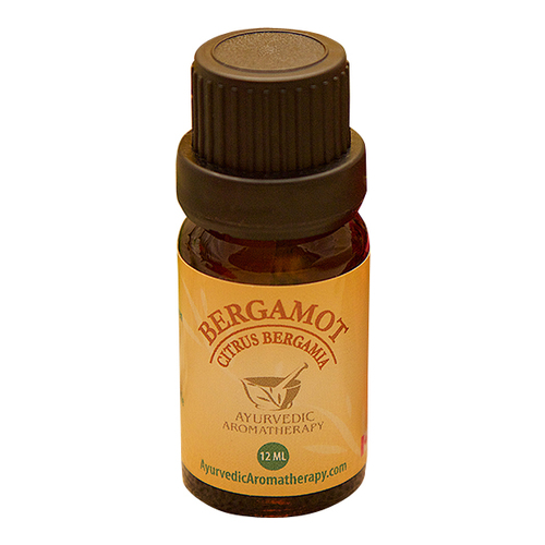 Ayurvedic Aromatherapy Bergamot Essential Oil on white background