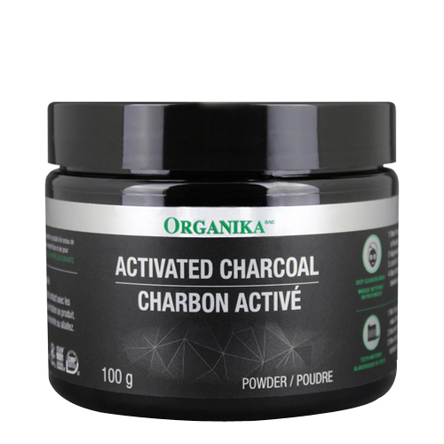 Organika Activated Charcoal Powder on white background
