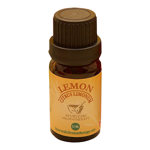 Ayurvedic Aromatherapy Lemon Essential Oil on white background