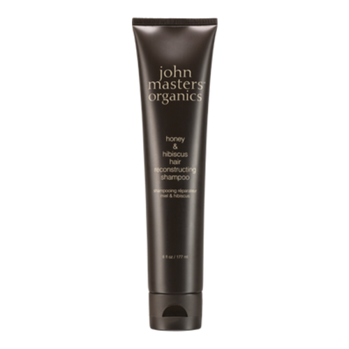 John Masters Organics Honey and Hibiscus Hair Reconstructing Shampoo on white background