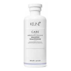 Care Absolute Volume Shampoo on white background